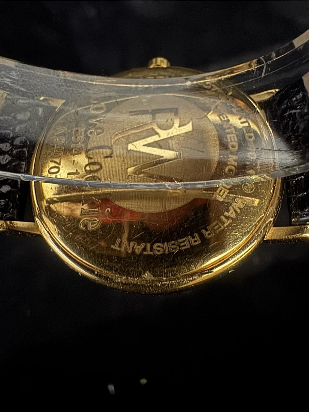 #137 Raymond Weil Gold Case White Dial Watch with Black Leather Strap